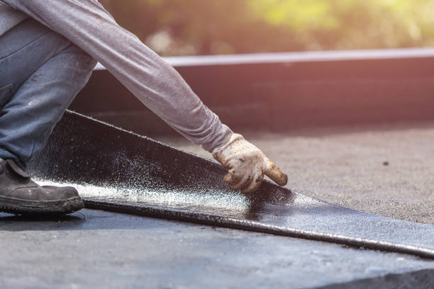 Professional Basement Waterproofing technician working in Harrisburg, OR